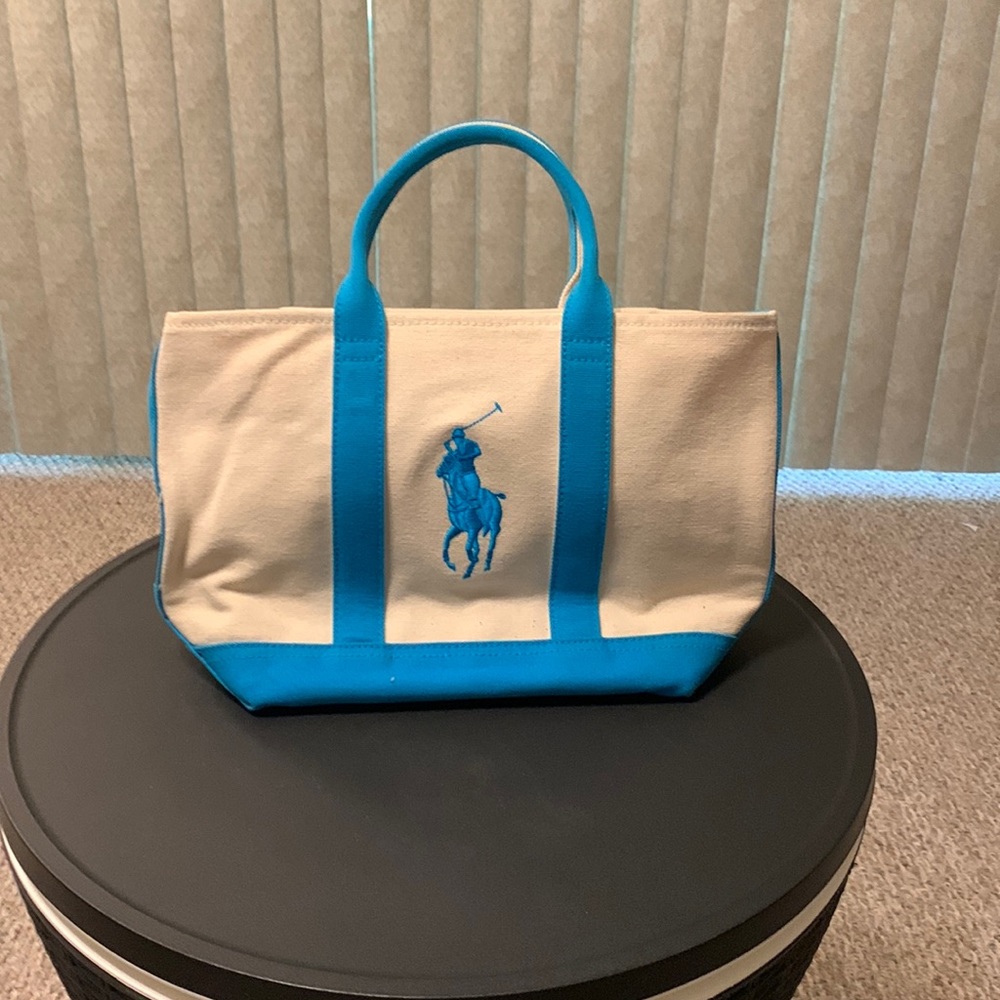 Never used small/ medium size Ralph Lauren bag.